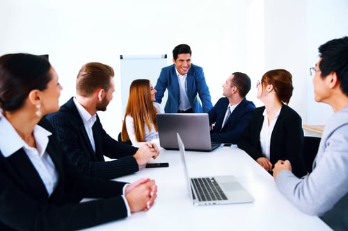 Businesspeople sitting at the table on a meeting
